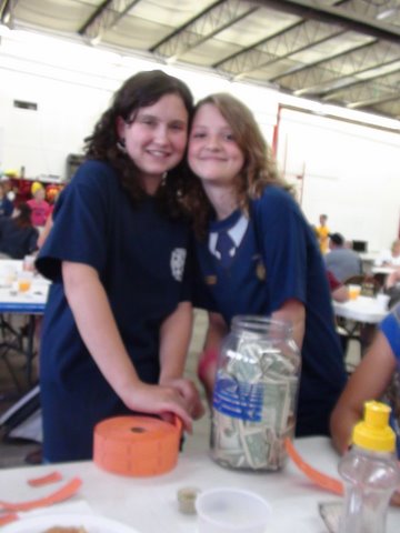 07-04-2010_Sienna__McKenzie_selling_VFD_raffle_tickets