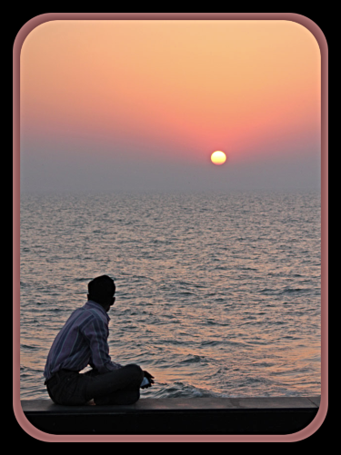 man sunset thinking