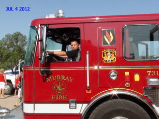2012-07-04 Trent_Miller_in_Fire_Truck